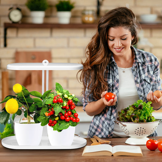woman with harvest joy hydroponics lamp